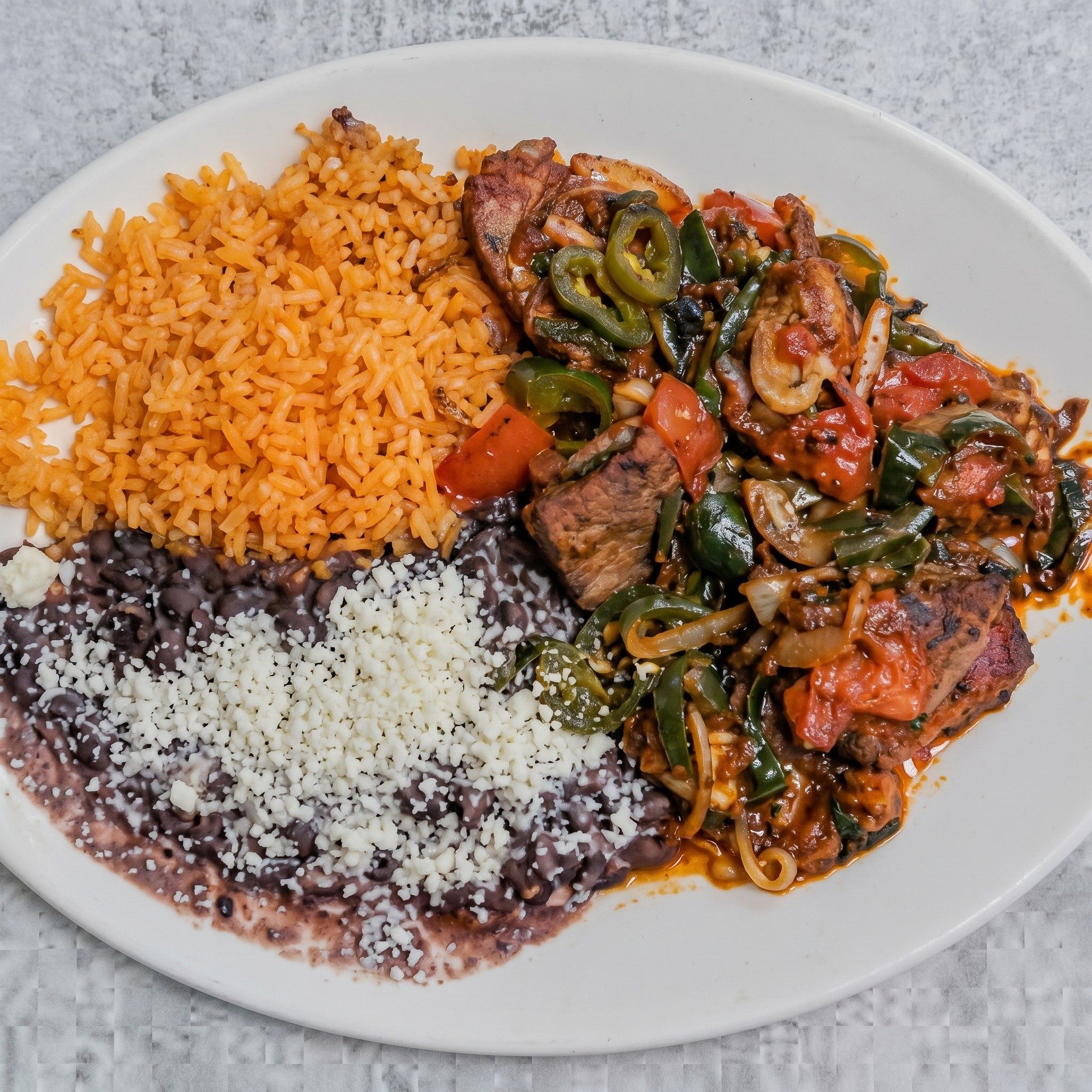 38. Costillas De Puerco a la Mexicana.